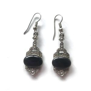 Black Earrings silver tone setting. Pierced wires